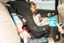 How much should a baby weigh to face forward in car seat