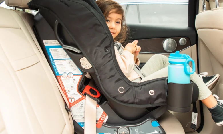 How much should a baby weigh to face forward in car seat