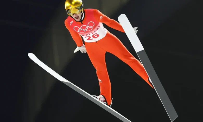 How is it possible for ski jumpers to stay in the air so long and how do they train for that