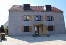 Finished 3D printed house with layered concrete walls in Germany